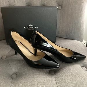 Gorgeous Coach black patent leather pumps. Size 6